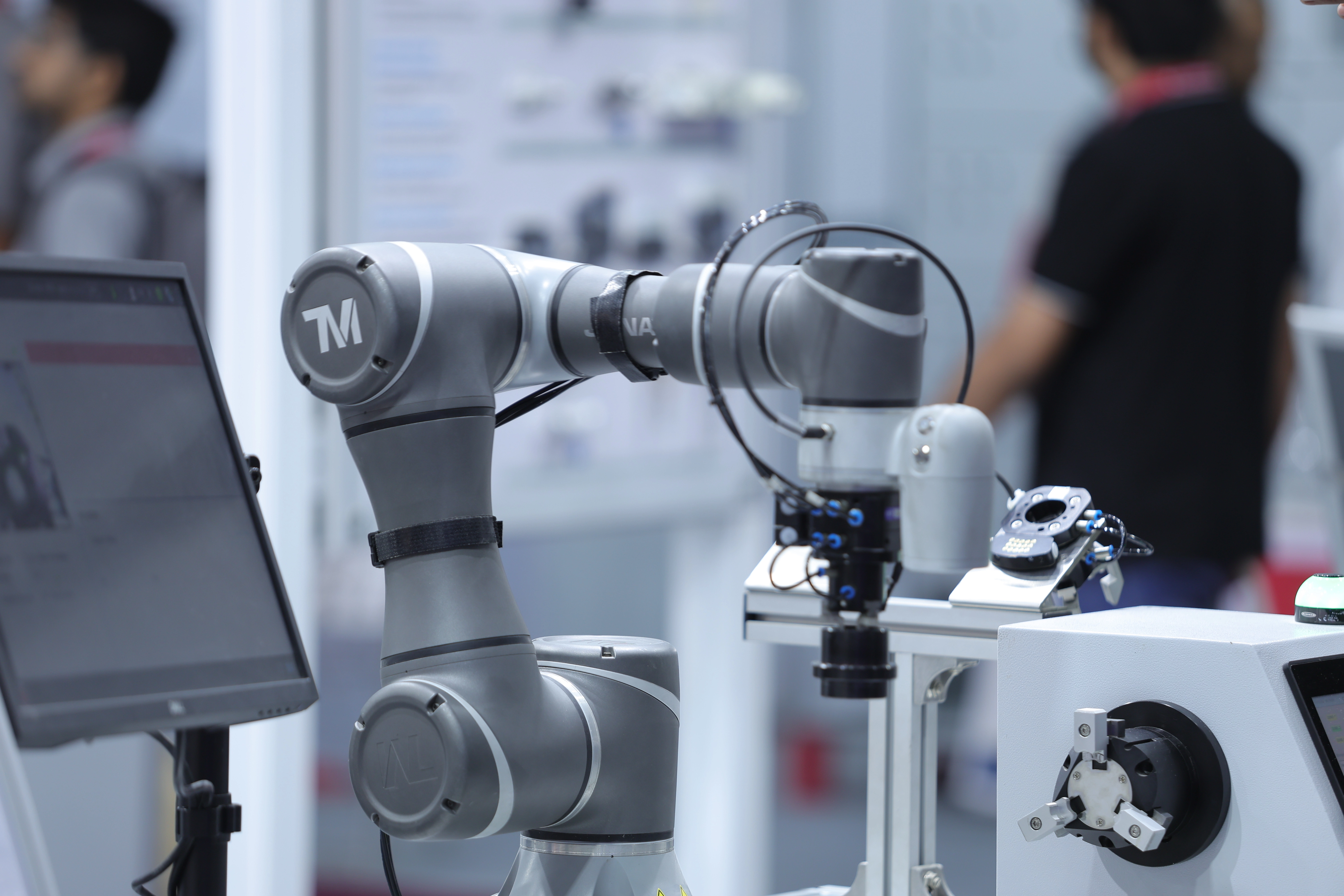 AI and digital vision themed entrance display at a past Automation Expo
